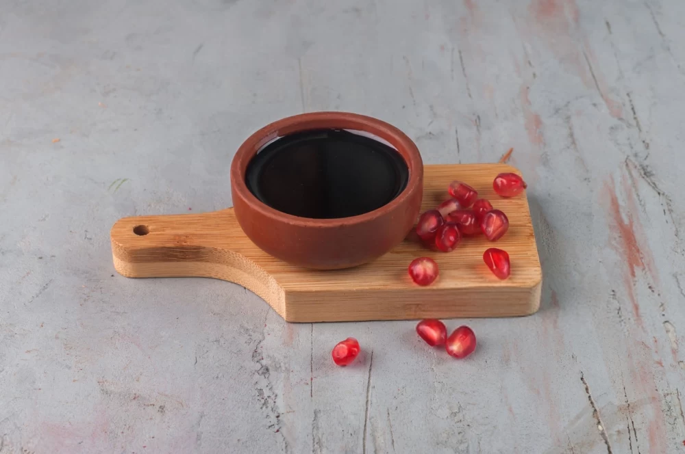  سیاه کردن رب انار