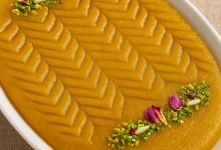 طرز تهیه حلوای شیر خشک خوشمزه و مخصوص؛ حلوای خوشرنگ، لطیف و مجلسی با عطر هل