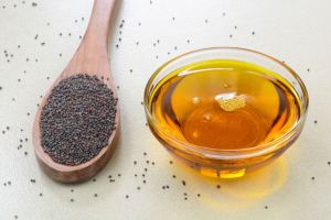 مزایای مالیدن روغن سیاه دانه به شکم برای سلامت گوارش و پوست