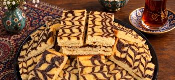 طرز تهیه تی تاپ خانگی؛ همان کیک نوستالژیک خوشمزه با مغز شکلاتی!