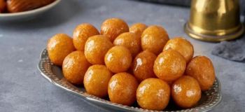 طرز تهیه شیرینی لگیمات خوشمزه و مخصوص به روش بوشهری؛ شیرینی ترد و طلایی جنوب