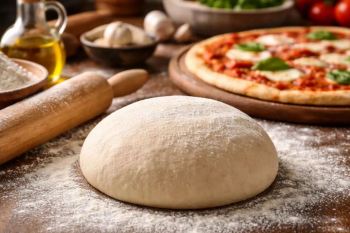 طرز تهیه خمیر پیتزا بدون خمیرمایه؛ نرم، لطیف و آماده در کمترین زمان!