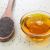 مزایای مالیدن روغن سیاه دانه به شکم برای سلامت گوارش و پوست