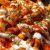 طرز تهیه سیب زمینی پنیری اسپشیال رستورانی؛ ترد و طلایی با پنیر کش دار و سس مخصوص!